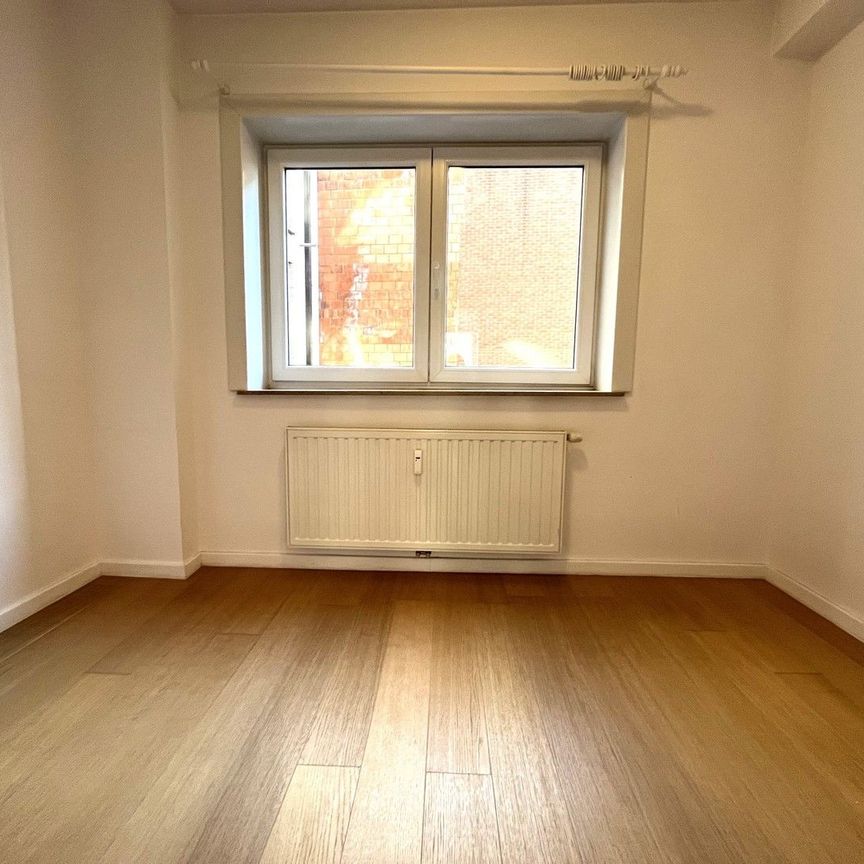 Appartement met 3 slaapkamers gelegen in het centrum van Genk - Photo 1