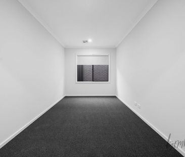 Spacious 4-Bedroom Family Home with Modern Features - Photo 3