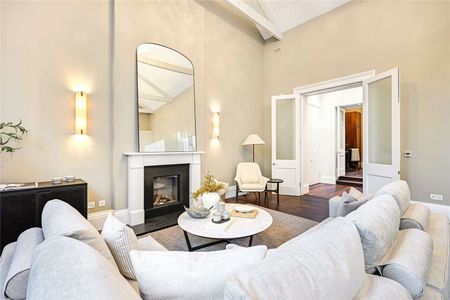 A Masterfully Refurbished Six-Bedroom Townhouse on Cranley Place - Photo 2