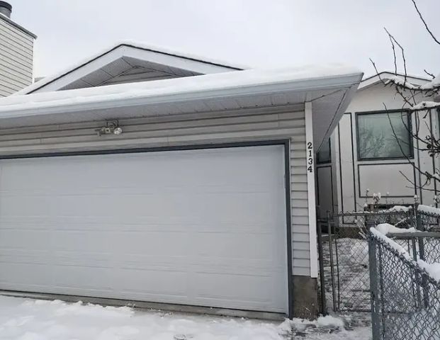 Vibrant Bi-Level Style Family Home | 2134 19 Street Northeast, Calgary - Photo 1