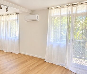 Freshly Updated 2-Bedroom Apartment – Just a Stroll to the Broadwater! - Photo 1