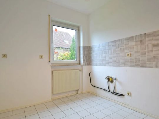 Gemütliche Erdgeschosswohnung mit großer Terrasse in Aschaffenburg-Schweinheim - Photo 1