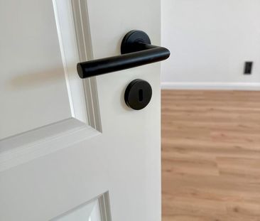 ERSTBEZUG : STILVOLLE 2-RAUM WOHNUNG MIT TERRASSE & TG - Foto 1