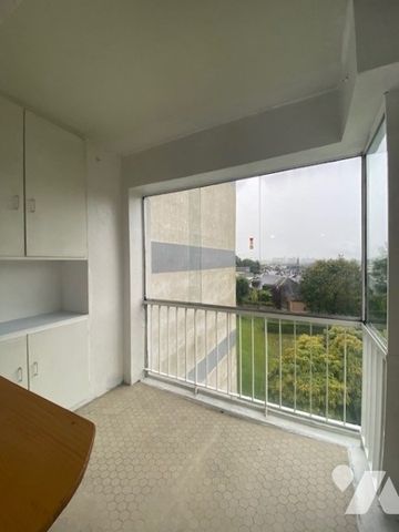 Appartement F3 avec balcon, garage et 2 caves dans une résidence sécurisée - Photo 5