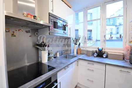 Location Appartement 3 pièces 62m² PARIS 18ème - Photo 5