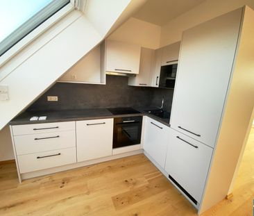 Charmante 2-Zimmer-Dachgeschosswohnung mit Terrasse - Photo 4