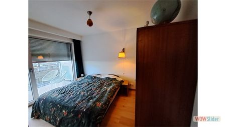Een gunstig gelegen appartement met terras en lift - Foto 4