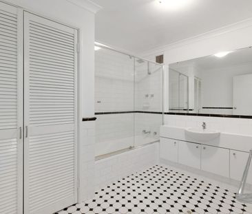 Elegant Two-Level Living at Claisebrook Cove - Photo 6