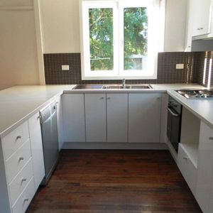 RENOVATED AND WELL LOCATED HOME - Photo 2