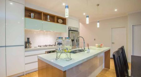 Spacious Furnished Family Home with Butler’s Kitchen Located In Mission Heights School Zone - Photo 3