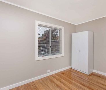 RENOVATED FAMILY HOME WITH LIGHT AND AIRY FEEL - Photo 3