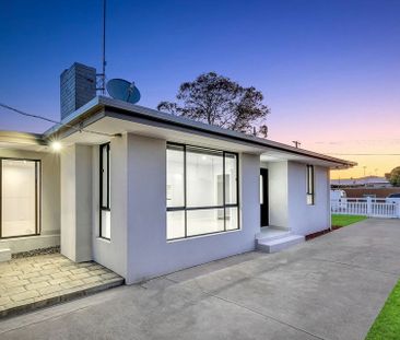 RENOVATED FAMILY HOME IN GREAT LOCATION - Photo 6