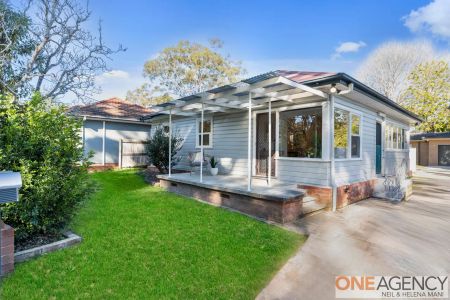 “SUN-FILLED FAMILY HOME IN PRIME LOCATION” - Photo 2