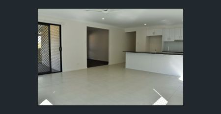 Modern 4-Bedroom Family Home in Highly Sought-After Joyner - Photo 2