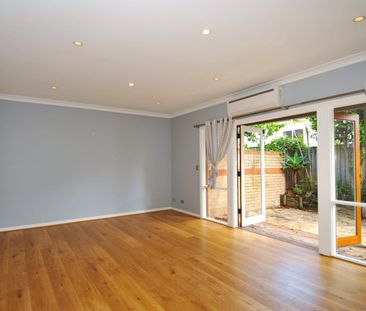 North-facing well maintained 3-bedroom townhouse - Photo 1