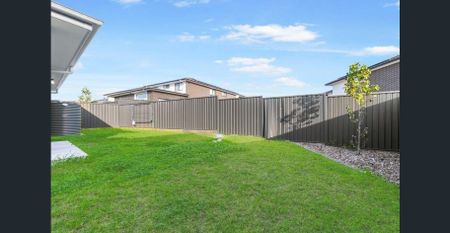 Modern Family Home with Spacious Study | Prime North Kellyville Location - Photo 2