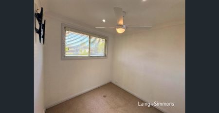 Modern two-bedroom home with covered entertaining area - Photo 5