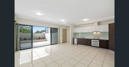 Suave Villa-Style Townhouse - Photo 3