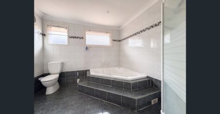 Spacious Brick Home with Inviting Pool and Expansive Outdoor Entertaining Area - Photo 4