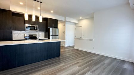 Modern 2 Bed 2 Bath Townhome In Springbank Hill | Garage - Photo 3