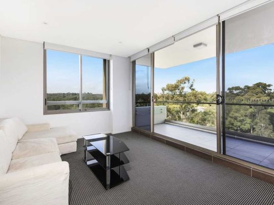 Partially Furnished I Top Floor Apartment - Photo 1