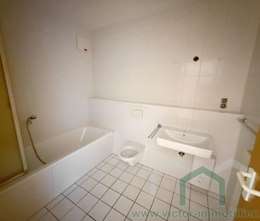 ** 2-Zimmer-Wohnung mit Balkon, Einbauküche und TG-Stellplatz im Ze... - Photo 4