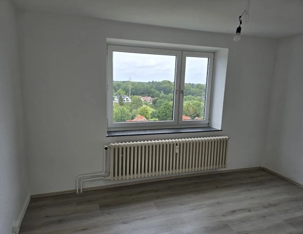 Gemütliche Wohnung im Dachgeschoss mit ca. 71,46m² Wohnfläche und Loggia - Foto 1
