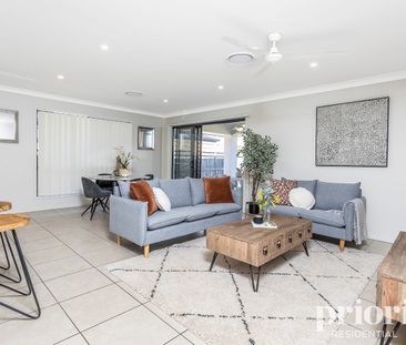 Spacious and modern lowset across from parkland - Photo 1