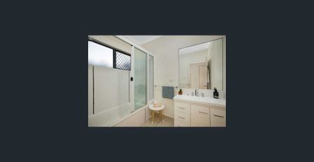 Large & Modern Family Home Situated in the Heart of Mount Louisa! - Photo 3