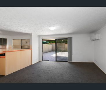 Charming Two-Bedroom Unit with Generous Private Courtyard in Secure... - Photo 1