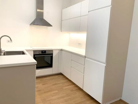 1140! Helle 2-Zimmer Wohnung mit Balkon und Tiefgaragenplatz ab Juni 25! - Photo 4