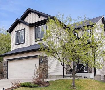 Spectacular mountain view, walkout basement, 5 bedroom home | Calgary - Photo 1