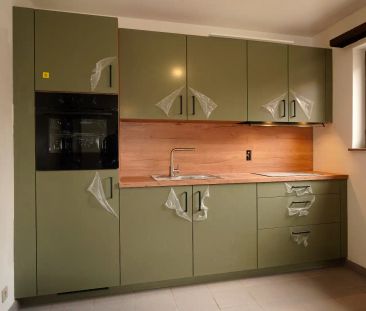 Gelijkvloers appartement met 1 slaapkamer en garage te Lokeren - Photo 2