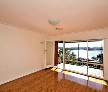 ENVIABLE LOCATION WITH WATERVIEWS! - Photo 2