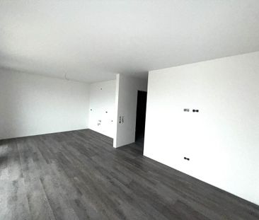 Charmante Obergeschosswohnung in ruhiger Lage mit Einbauküche. - Photo 1