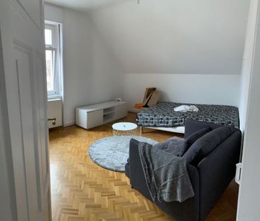 Charmantes Dach-Apartment mit Parkett und Wohnküche in der Oberurseler City - Foto 6