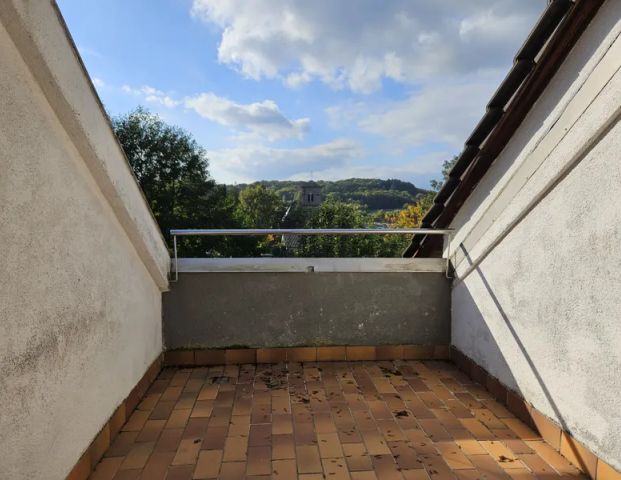 Moderne Dachgeschosswohnung in ruhiger Lage - Foto 1