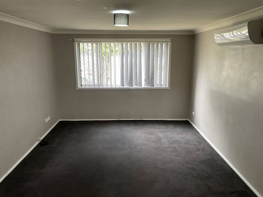 NEAT AND TIDY THREE BEDROOM HOME - Photo 1