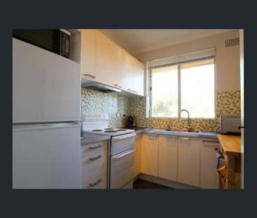 Location! Location! Modern Convenience with A/C **Available 22/12/2... - Photo 3