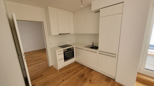 Smarte 2-Zimmer-Wohnung mit Hofterrasse: Hochwertige Ausstattung + Ausgezeichnetes Raumkonzept - Photo 1