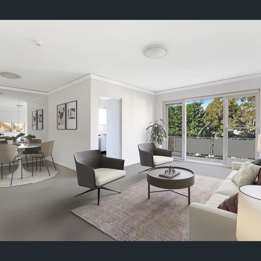 Spacious 3 Bedroom Unit with LockUp Garage - Photo 1