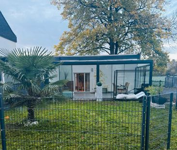 Traumhafte Bungalow-Wohnung mit Wintergarten, Garten & Klima - Photo 1