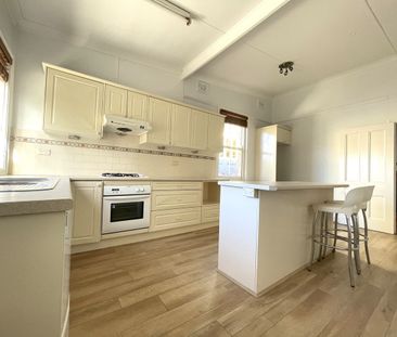 Charming 2 Bedroom Semi Home - Photo 1