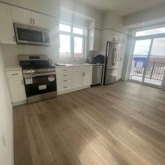 BRAND NEW END UNIT - Stacked Townhouse in Guelph - Photo 1