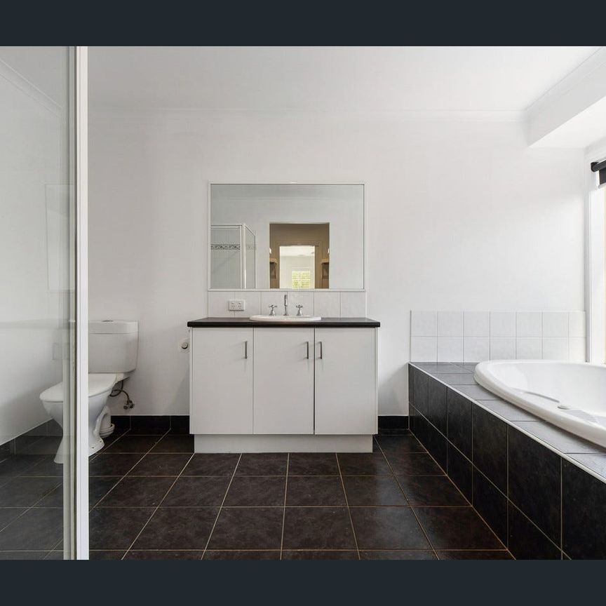 Expansive 4-Bedroom Family Home - Photo 1