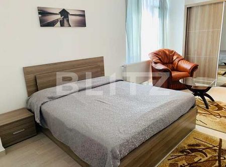 Studio 40 mp, prima inchiriere, mobilat modern, imobil nou, zona Soporului - Photo 4