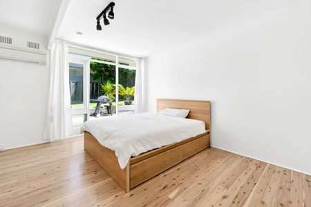LIGHT-FILLED FAMILY RETREAT OFFERING SPACE AND CONVENIENCE - Photo 2