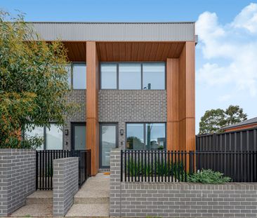 Modern Double-Storey Townhouse with Reverse Living Design - Photo 3