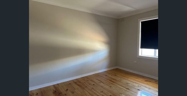 Family Home with Modern Comforts and Spacious Backyard - Photo 1