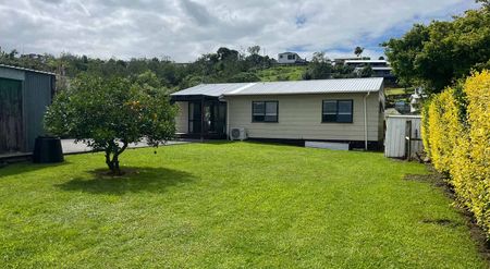 Sunny 3BR Home in Heart of Hairini! - Photo 2